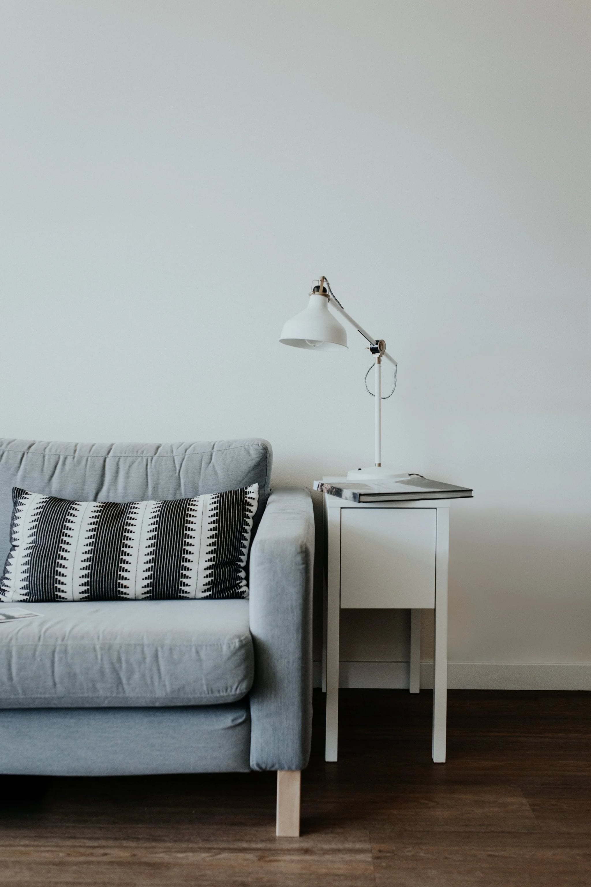 Cozy living room with gray sofa at Hallmark Station